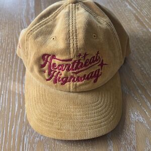 The Cannons Band Yellow Corduroy Cap with Red Embroidery. Bought On Tour.